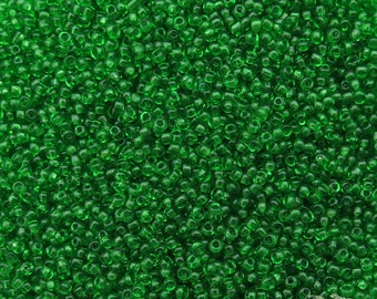 Size 14/0 vintage Venetian glass micro seed beads in transparent grasshopper green. Tiny rare antique microbeads for fine detail miniatures