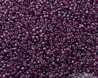 Size 11/0 antique Italian seed beads in transparent plum purple. 10 grams of vintage Venetian glass beads for beaded jewelry creations.
