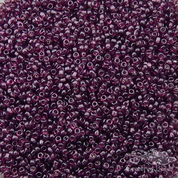 Size 11/0 antique Italian seed beads in transparent plum purple. 10 grams of vintage Venetian glass beads for beaded jewelry creations.