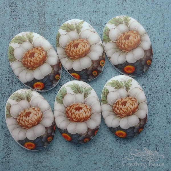 1960's vintage West German glass cabochons with white flower pattern. 18x25 mm white floral decal cabs. Choose 2 or 4 pc