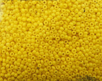 Size 11/0 vintage Venetian seed beads in opaque crayon yellow. 10 grams of late 1800's Italian Murano glass beads.