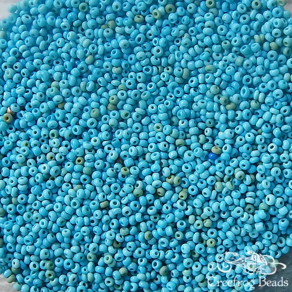 Size 14/0 vintage Italian glass seed beads in opaque turquoise blue green. 5 grams of tiny size 13 or 14 beads for beadwork restoration.