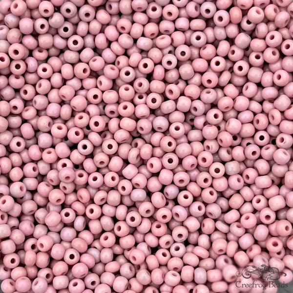 Old Czech glass seed beads, size 8/0 medium pink mix. 1990's vintage rocailles in opaque mauve & rose hues - sold by the ounce or hank.