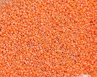 Size 20/0 antique glass microbeads in opaque orange coral. Late 1800's vintage micro seed beads. Rare old beads for doll arts & beadwork.