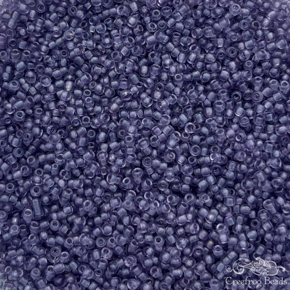 Vintage size 12/0 French glass seed beads in transparent smokey purple. 10 grams of colorfast handmade antique beads for jewelry making.