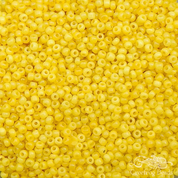 Vintage Venetian glass seed beads in greasy yellow corn. 10 grams of handmade antique Italian size 9/0 seed beads in translucent opal yellow