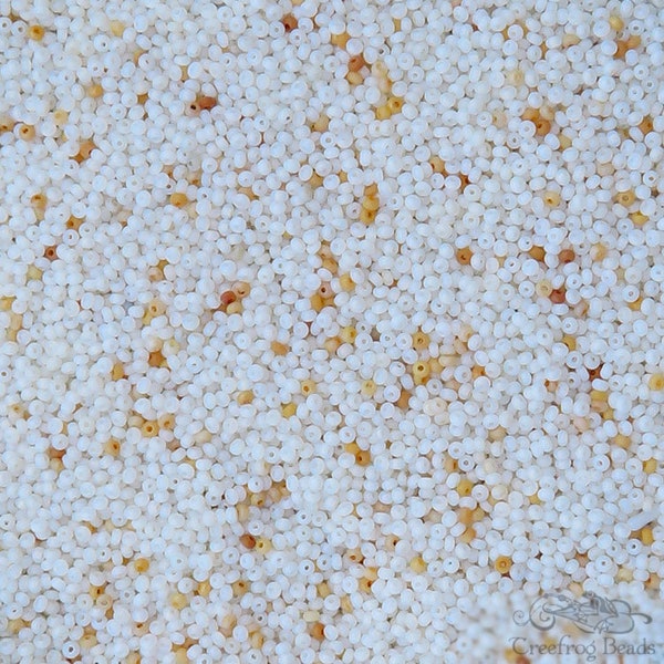 Antique Venetian glass microbeads in tiny size 18/0. Italian micro seed beads in sandy white opal. Very small beads for detailed beadwork.