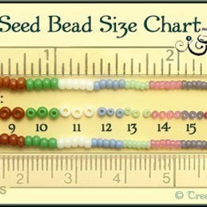 May include: A chart showing the different sizes of seed beads, measured in inches and centimeters. The chart includes a ruler with markings for both inches and centimeters, and a row of beads of each size. The beads are arranged in order of size, from smallest to largest. The chart also includes the bead size number for each row of beads.