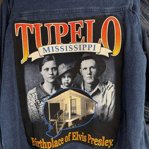 Ladies&#39; Elvis Presley denim jacket. Ladies&#39; Gloria Vanderbilt size XL denim jacket with attached Elvis Presley tee on the back. 1 of a kind
