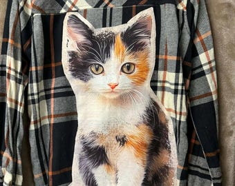 Ladies' black, brown and beige plaid flannel shirt, Weekends Brand Size Small, with large Calico cat attached to the back. one of a kind