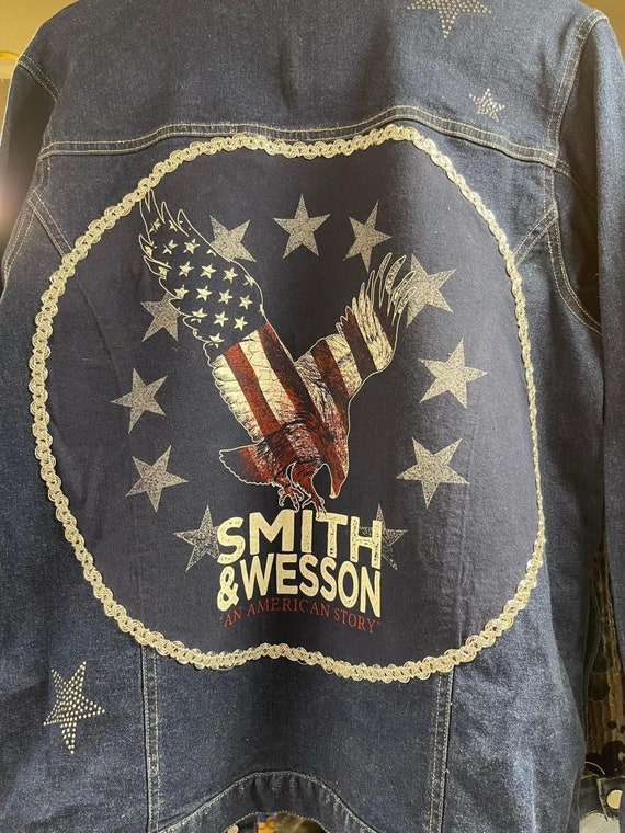 Smith and Wesson denim jacket, Ladies Medium, The Quacker Factory Brand,  Upcycled Smith and Wesson tee attached to the back