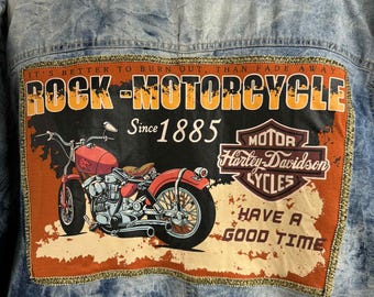 Ladies Harley Davidson denim jacket. Ladies Denim brand denim jacket size 18-20, with Harley Davidson tee attached to the back. 1 of a kind