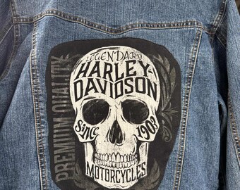 Ladies' Harley Davidson skull denim jacket. Ladies' denim jacket is a Bill Blass Brand, size Large, with a Harley Davidson back. 1 of a kind
