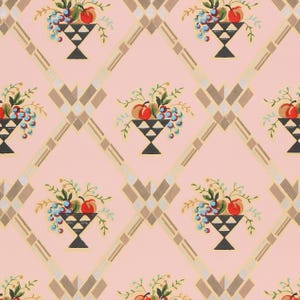 May include: A repeating pattern featuring stylized fruit baskets on a pink background. Each basket contains red apples and blue grapes. The baskets are black with geometric designs. The background has a diamond pattern with tan and gray accents.