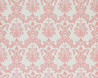 May include: Pink damask pattern wallpaper with a repeating design of stylized flowers and leaves.