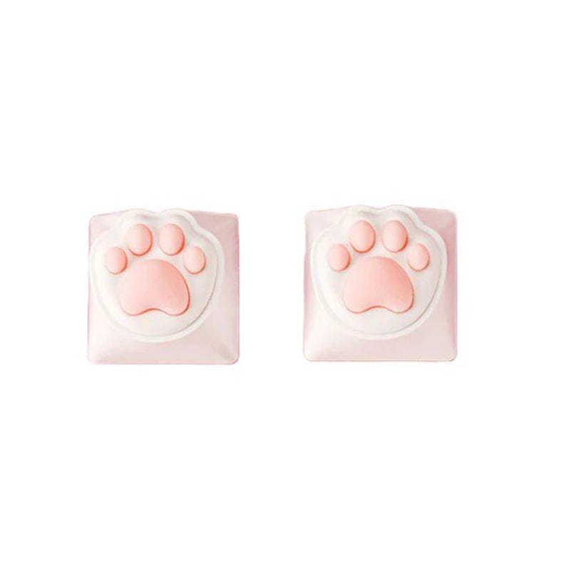 May include: Two pink keycaps with a white border and a raised pink paw print design.