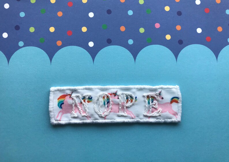 White on white ribbon with rainbow unicorns NOPE patch embroidered patch Handmade Sew on patch.
