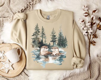 Sweatshirt with two otters swimming in nature, watercolor-style artistic design, perfect for nature and animal lovers
