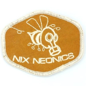 Nix neonics patch -- naturally-dyed -- organic cotton