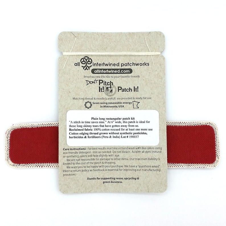 May include: Red rectangular fabric patch with white edging. The patch is 15 cm wide and is ideal for mending tears in fabric. The back of the patch has instructions for care and information about the fabric's origin. The text on the back reads "Don't Pitch It! Patch It!" and "Plain long rectangular patch kit".