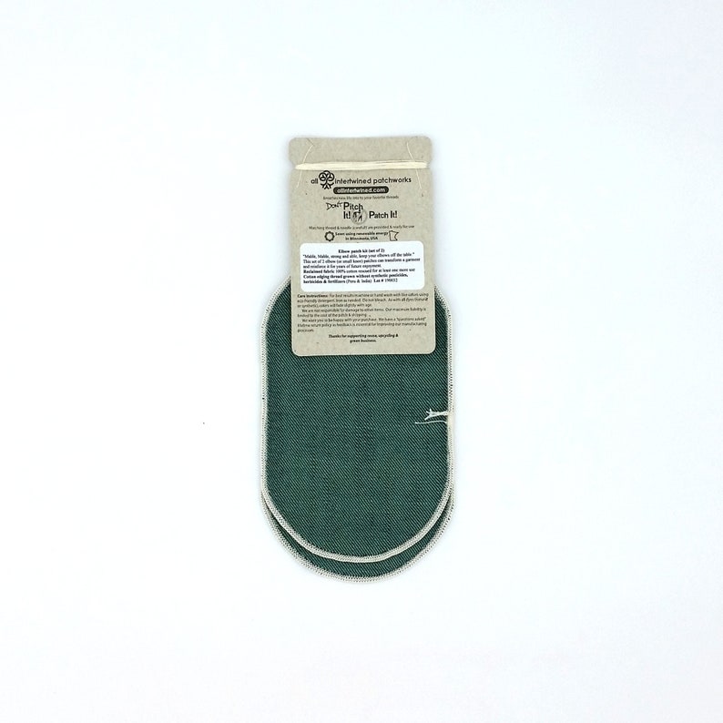 May include: Two dark green, oval-shaped fabric patches with a white border, packaged on a cardboard backing. The backing features text that reads "Don't Pitch It! Patch It!" and information about the product.
