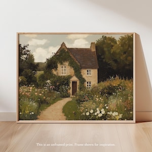 May include: A framed print of a quaint cottage scene. The cottage, with a brown roof and ivy-covered walls, is nestled amidst lush greenery and colorful flowers. A winding path leads to the cottage door. The text at the bottom reads: "This is an unframed print. Frame shown for inspiration."