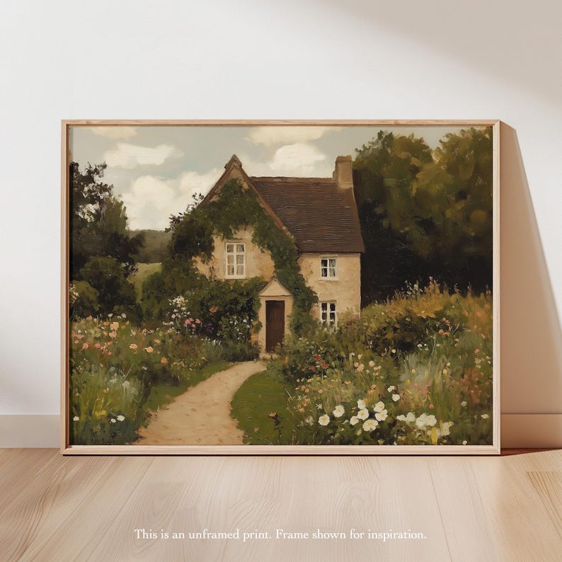May include: A framed print of a quaint cottage scene. The cottage, with a brown roof and ivy-covered walls, is nestled amidst lush greenery and colorful flowers. A winding path leads to the cottage door. The text at the bottom reads: "This is an unframed print. Frame shown for inspiration."