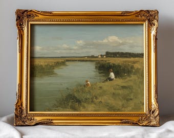 May include: A framed landscape painting with a gold ornate frame. The painting depicts a river scene with two figures fishing on the bank. The sky is blue with white clouds, and the overall color palette is muted.