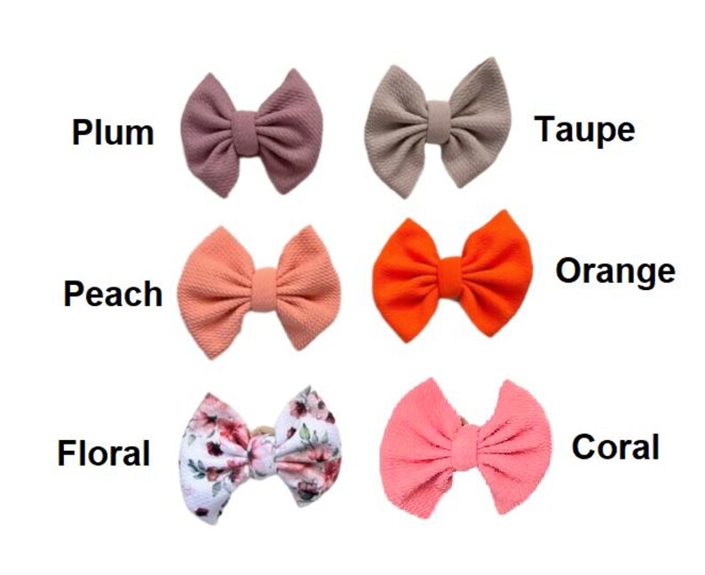 May include: Six fabric hair bows arranged in two columns. The left column features plum, peach, and floral patterned bows. The right column features taupe, orange, and coral bows. Each bow is labeled with its corresponding color name in black text.