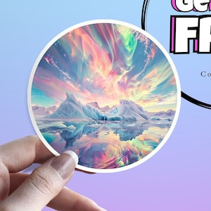 May include: A round sticker with a colorful aurora borealis reflected in a body of water with icebergs in the foreground.