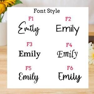 May include: A white card displays six different font styles for the name "Emily". The text "Font Style" is at the top. Each "Emily" is in a different font, labeled F1 through F6 in red.