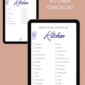 May include: Two digital tablets displaying a "New Home Kitchen Checklist" with a list of kitchen essentials. The word "Kitchen" is written in a cursive font. The background is a light peach color.