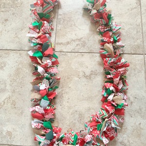 Red, green, white fabric garland with burlap