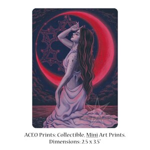 May include: A collectible mini art print featuring a woman in a flowing gown, set against a dark blue night sky with a red crescent moon and a decorative starburst. The dimensions are 2.5 x 3.5 inches.