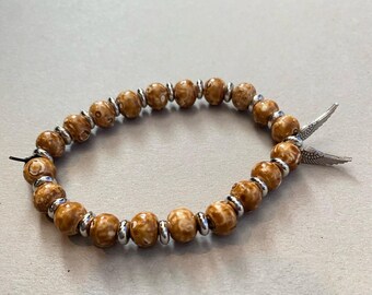 Pulsera de alas de ángel hecha a mano