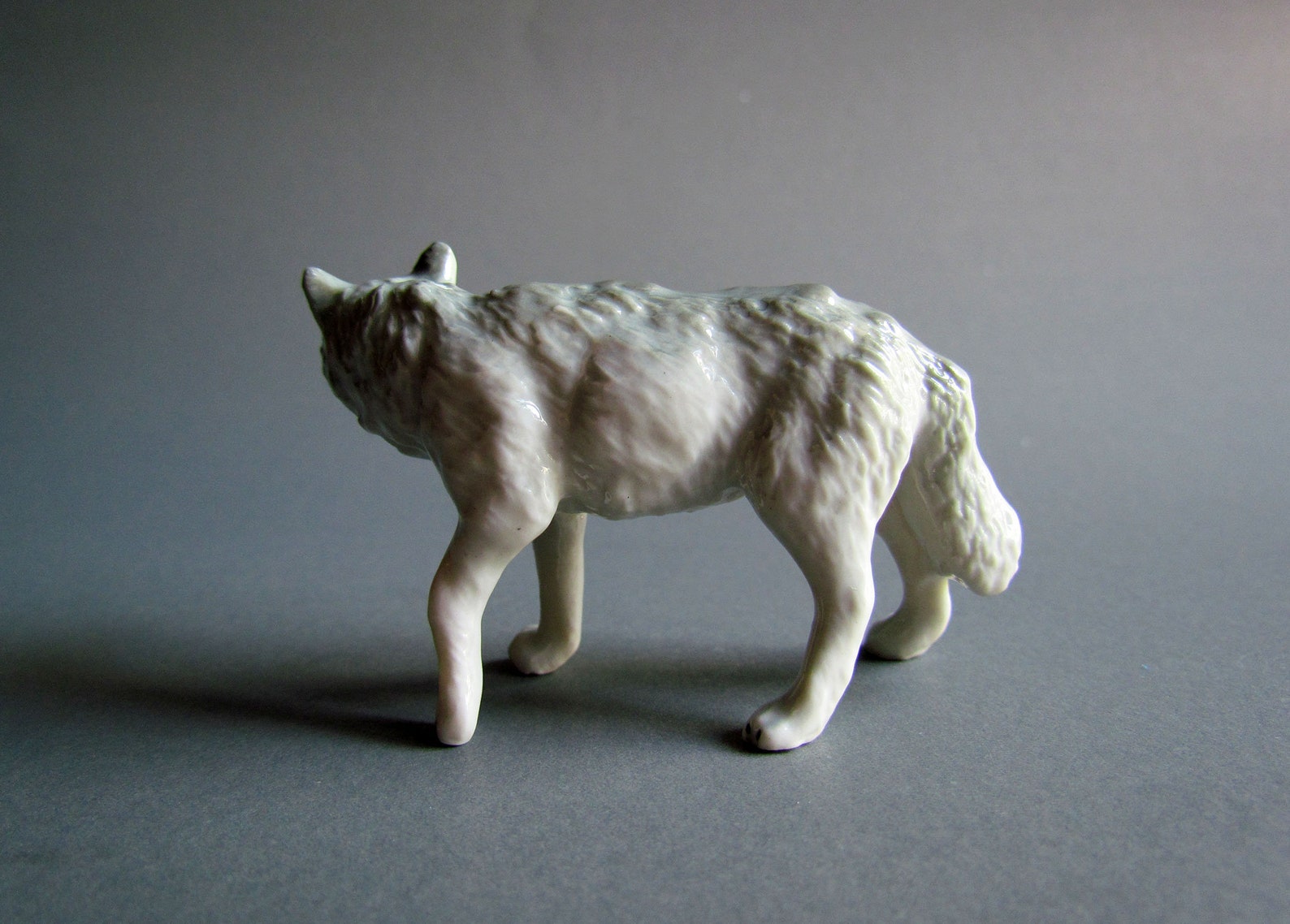 ceramic wolf statue