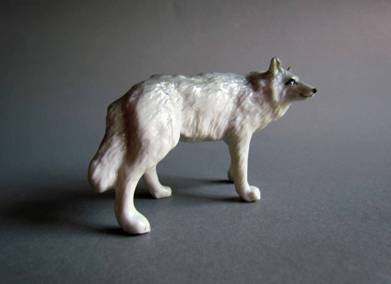 ceramic wolf statue