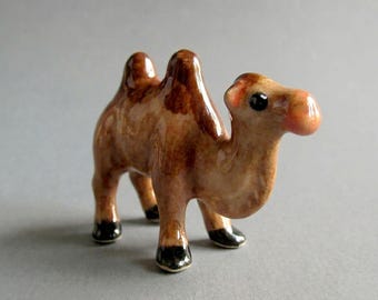 Miniature Ceramic Camel Figurine: Collectible Desert Animal Decor Brown