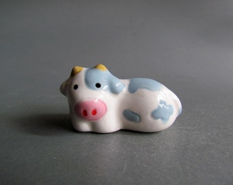 Cows Ceramic Figurine Chopsticks Rest Chopsticks Holder Cartoon Miniature arm Animal White Grey, White blue Collectible Decor Cute