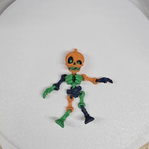 Colorful 3D Printed Halloween Skeleton Decoration with Articulated Joints