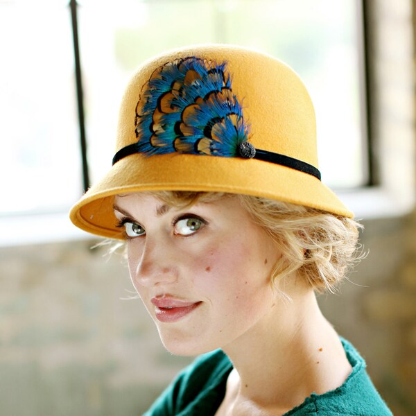 Mustard Womens Cloche Hat With Peacock Blue Feather Accent