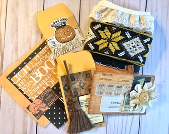Broom and Pumpkin Embellishments in a Halloween Junk Journal Ephemera Pack with Vintage Style Tags