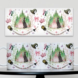 May include: White ceramic mug with a fantasy-themed design. It features a pink and black dress, a green castle, and the text "CHANGED FOR GOOD." The design includes pink bows, crowns, and witch hats. The mug is on a black surface.