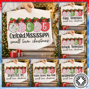 May include: White tote bags with colorful Christmas ornament designs. Each ornament displays a town name and a unique number sequence. The text "small town christmas" is also included. The bags are held up by hands.