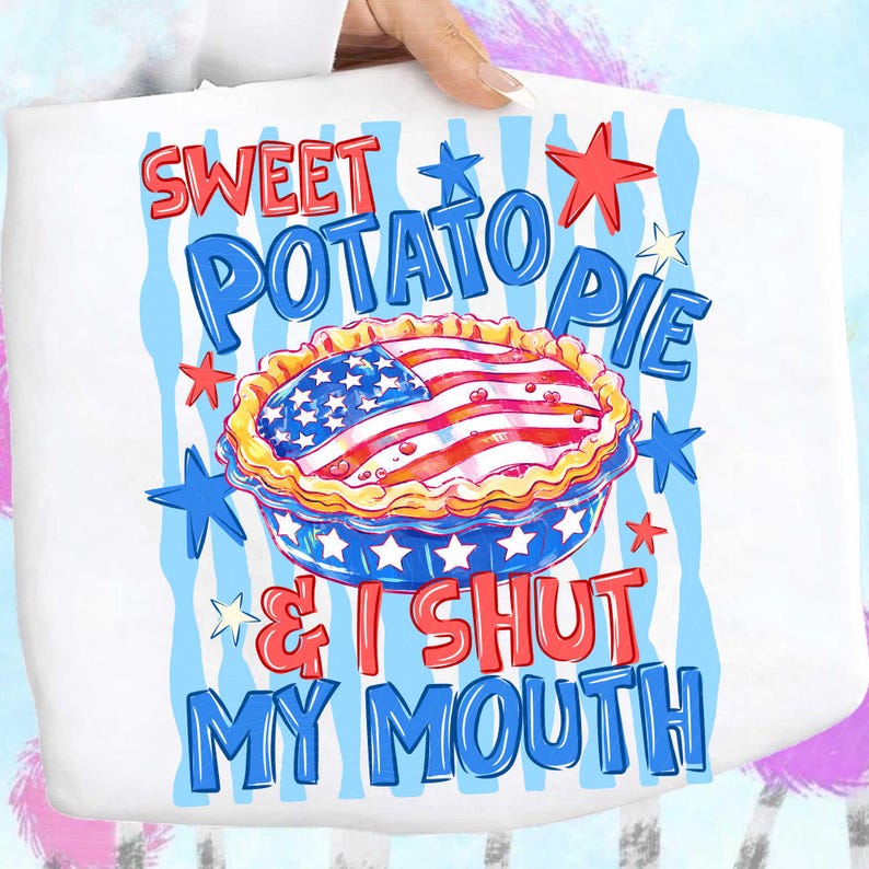 May include: White tote bag with a graphic of a sweet potato pie decorated with an American flag design. The text reads "Sweet Potato Pie & I Shut My Mouth" in red and blue. Blue and red stars are scattered around the pie.