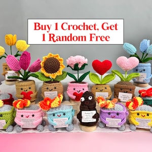 May include: A collection of handmade crochet flowers and characters, including tulips, sunflowers, and hearts, in small pots. The image includes the text "Buy 1 Crochet, Get 1 Random Free". The crochet items are in various colors, such as yellow, pink, and blue.
