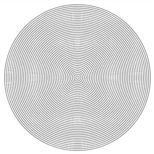 May include: A framed black and white abstract art print featuring concentric circles. The artwork is displayed above a wooden console table with decorative vases and a dried plant arrangement. The text at the bottom reads: "DESCARGA EL DISEÑO | IMPRIMELO EN CASA | Y CREA TU CUADRO."