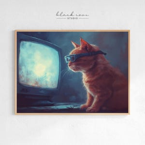 May include: A framed print featuring an orange tabby cat wearing blue glasses, gazing intently at a vintage television screen. The artwork has a dark, moody aesthetic, with the text "black cove STUDIO" in the upper left corner.
