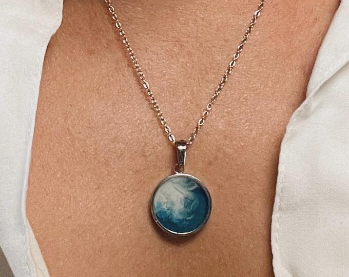Ocean Reach Pendant – One-of-a-Kind Resin Necklace in Bright Blue with White Wave Tendrils | Silver Circular Frame