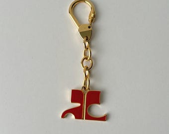 porte-clés vintage en or Courrèges rouge